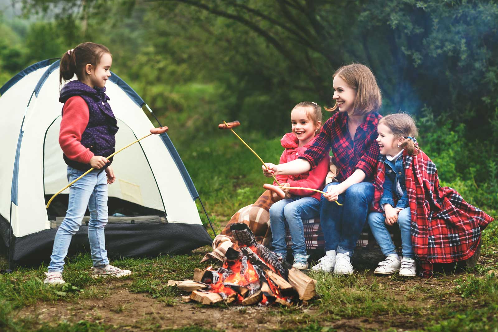 Family camping at campsite